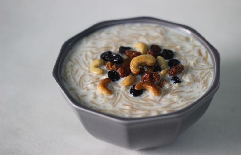 Creamy rice kheer garnished with nuts
